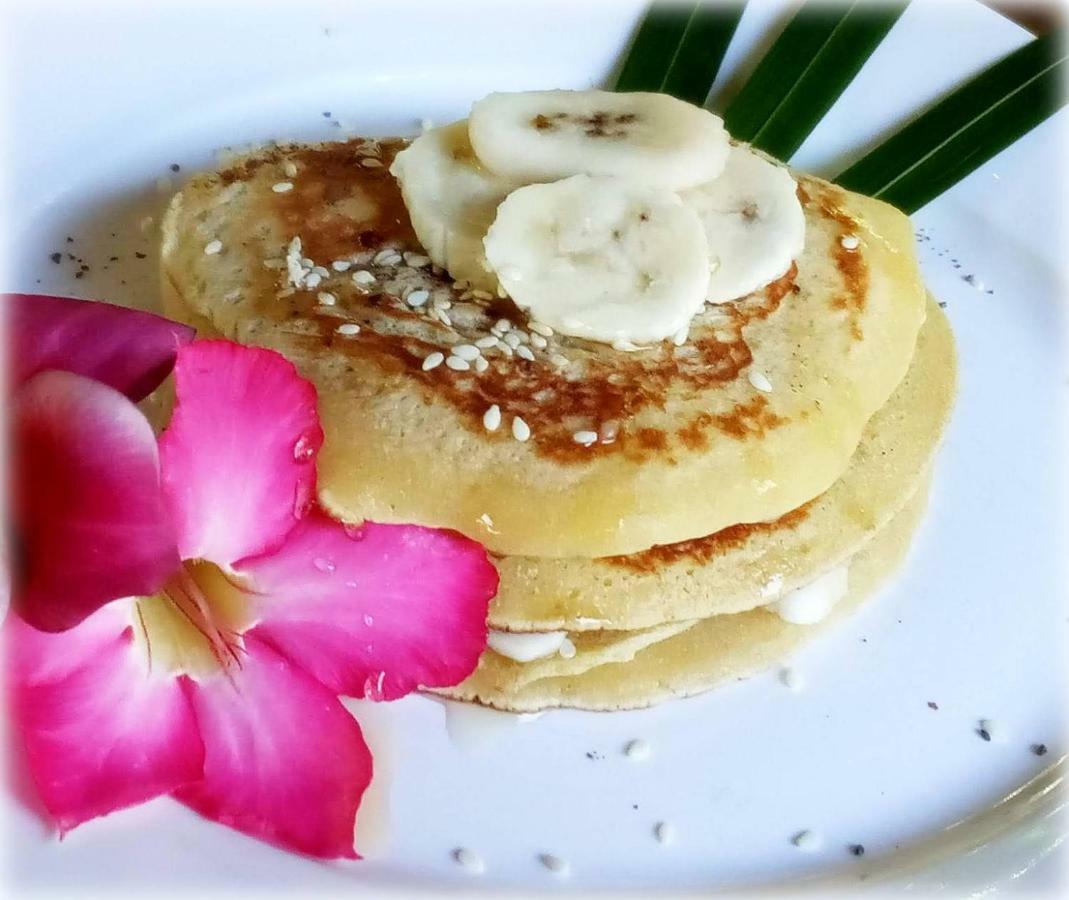 Mango Moon Hotel เปมูเตรัน ภายนอก รูปภาพ