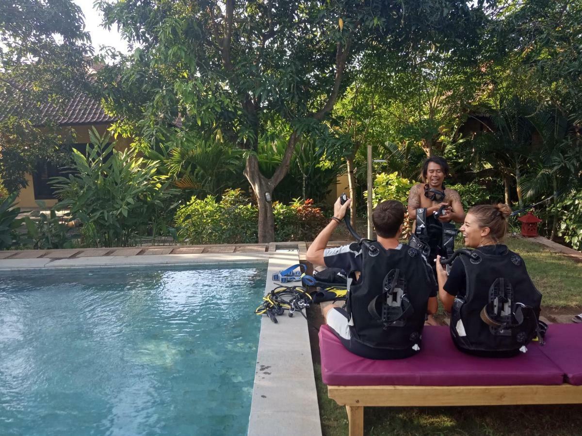 Mango Moon Hotel เปมูเตรัน ภายนอก รูปภาพ